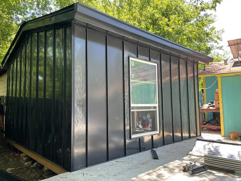 Black standing seam metal wall panels for Roof Inspection in Rose