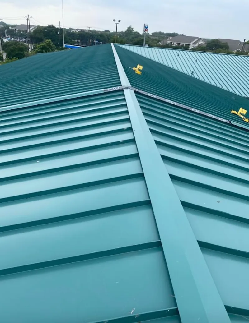 Green commercial metal roof ridge and valley for Metal Roof Repair in Rose